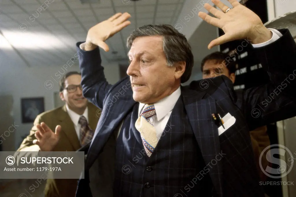 Businessman with his hands in the air