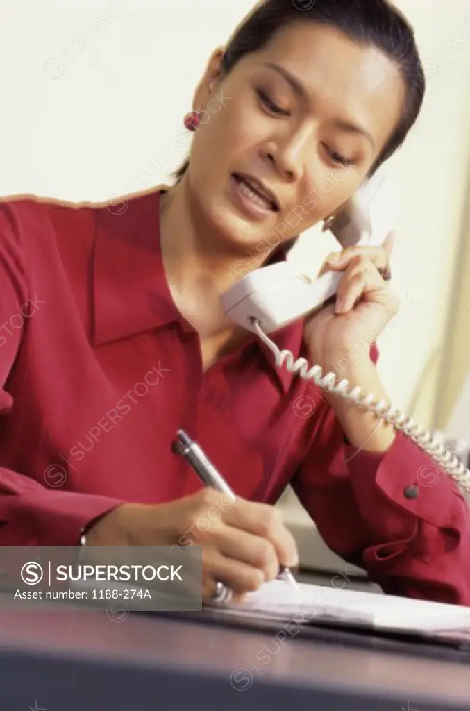 Businesswoman talking on the telephone