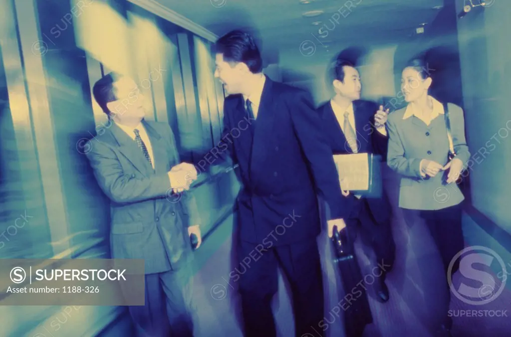 Business executives walking together