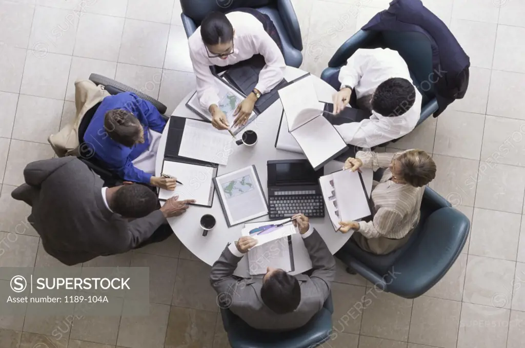High angle view of a group of business executives in a meeting