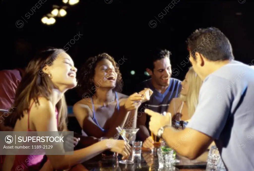 Group of young people in a bar
