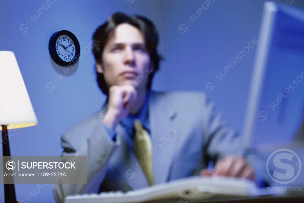 Businessman thinking in an office