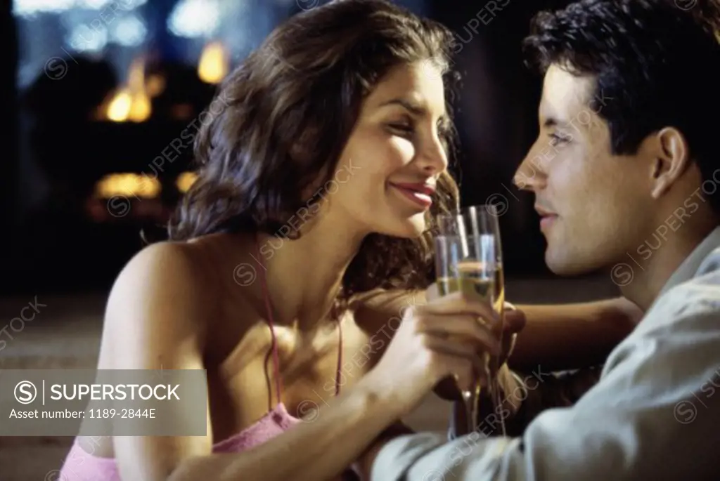Young couple drinking champagne