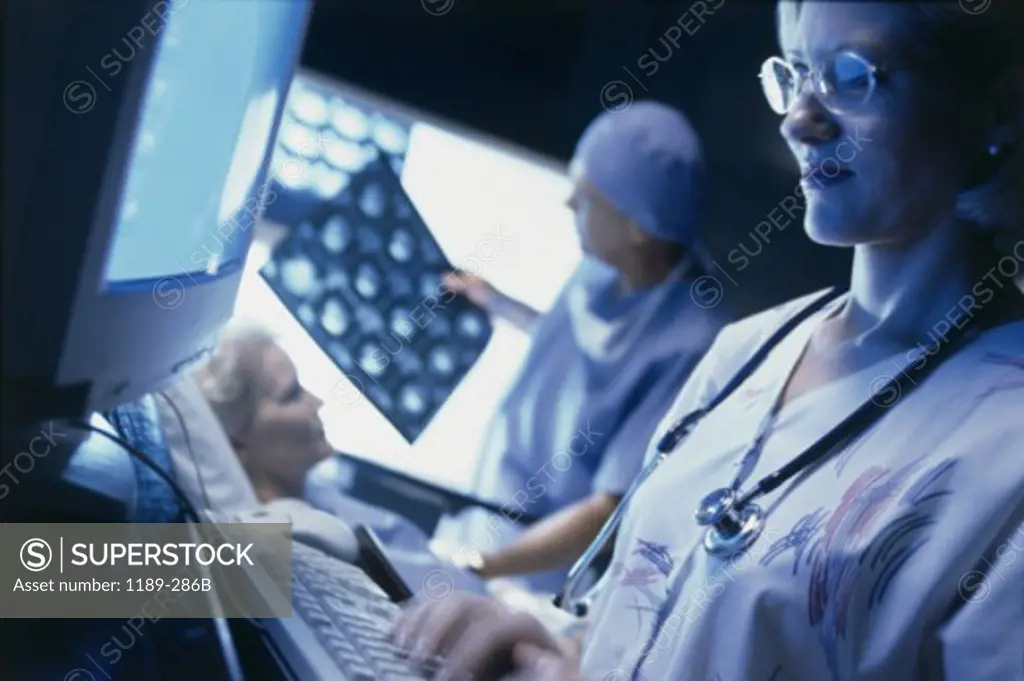 Female nurse using a computer