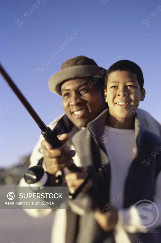 Father and his son fishing