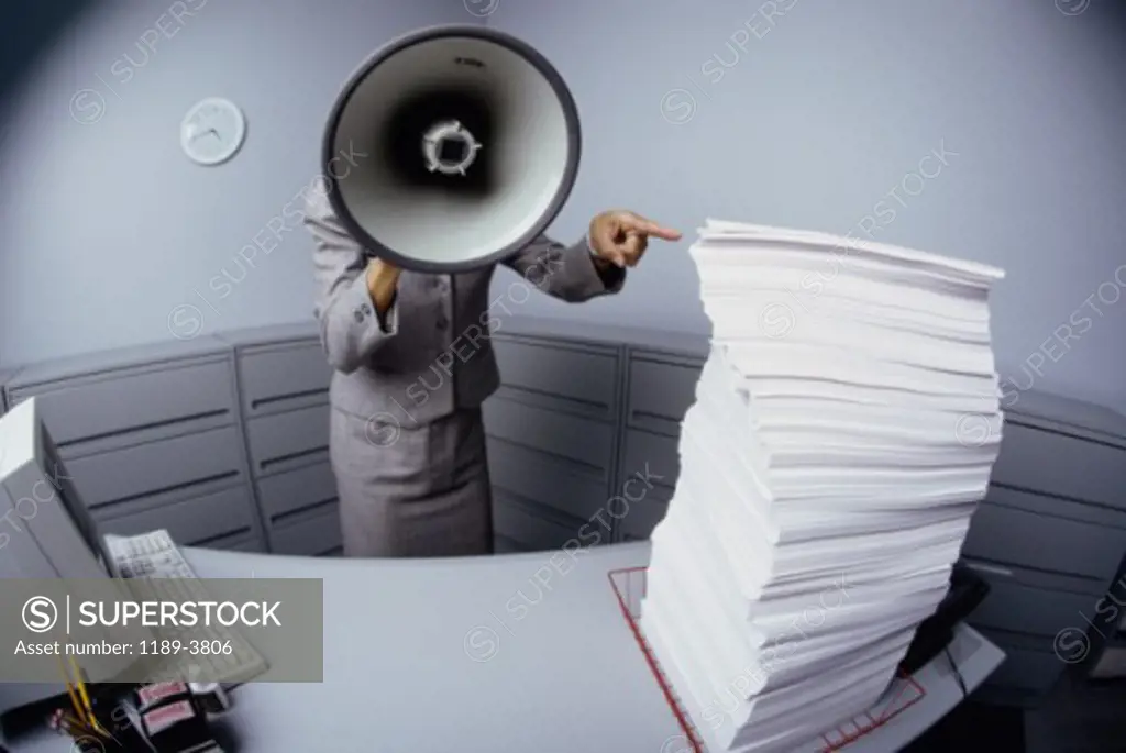 Businesswoman shouting into a megaphone