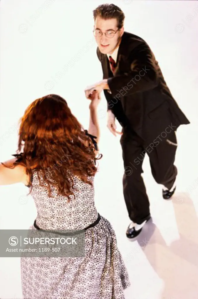 High angle view of a young couple dancing