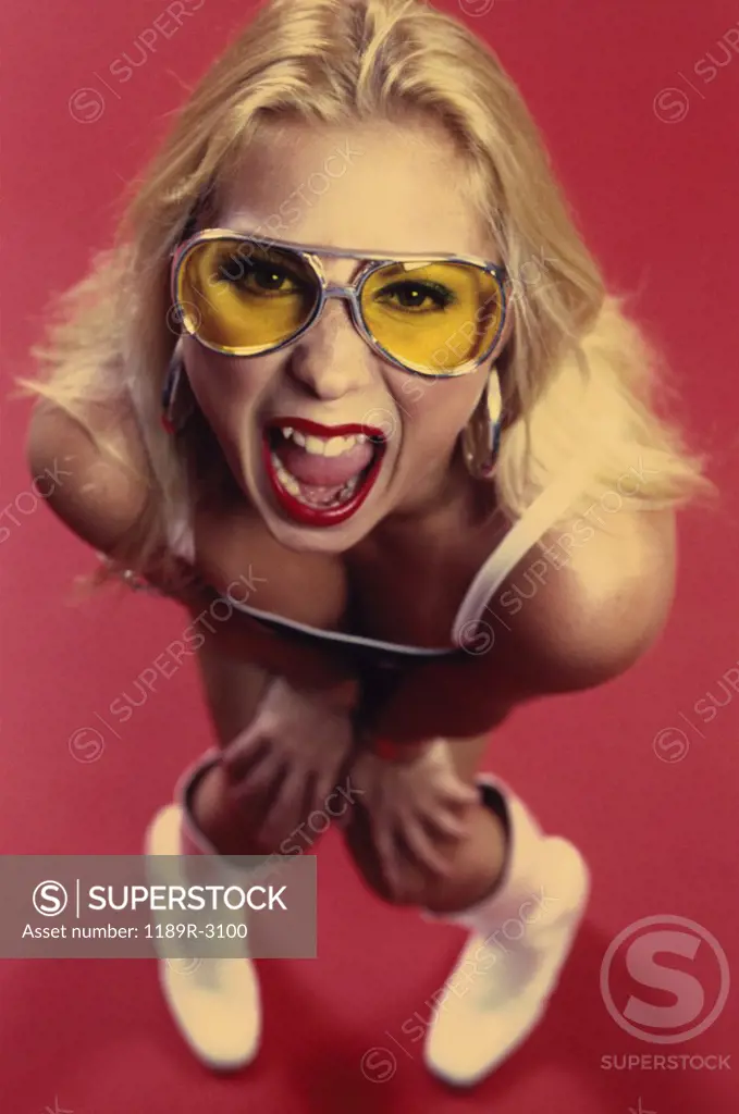 Portrait of a young woman screaming