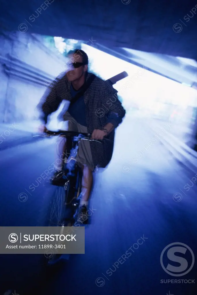 Male messenger riding a bicycle