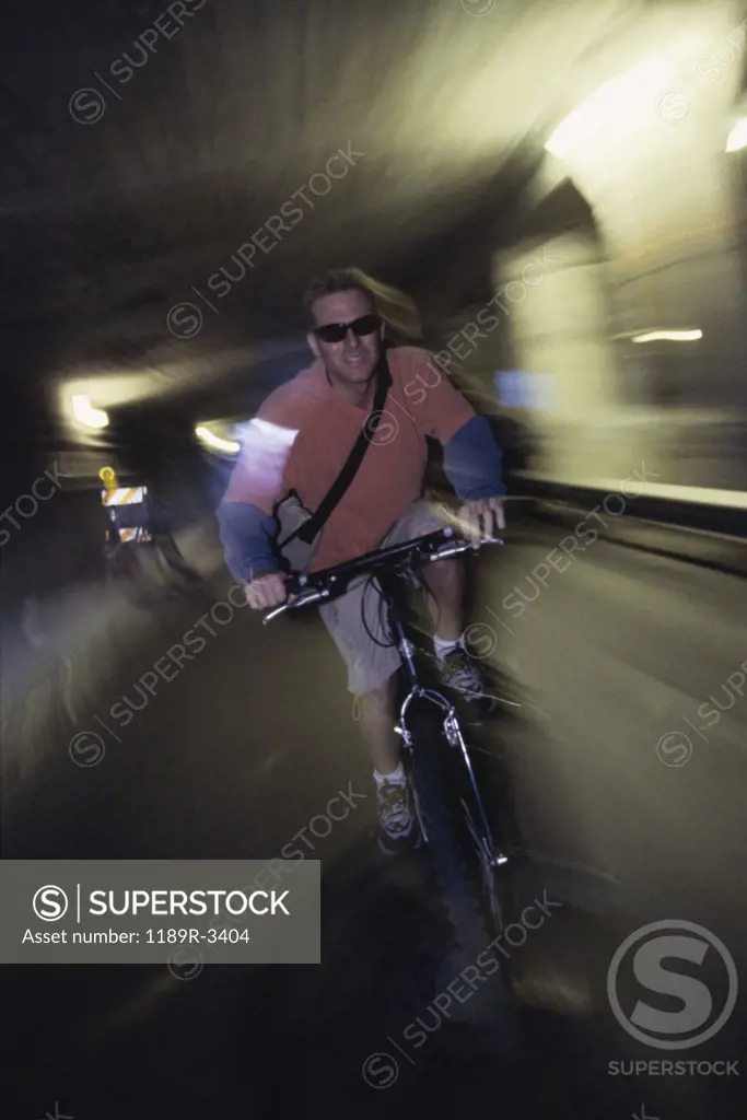 Male messenger riding a bicycle