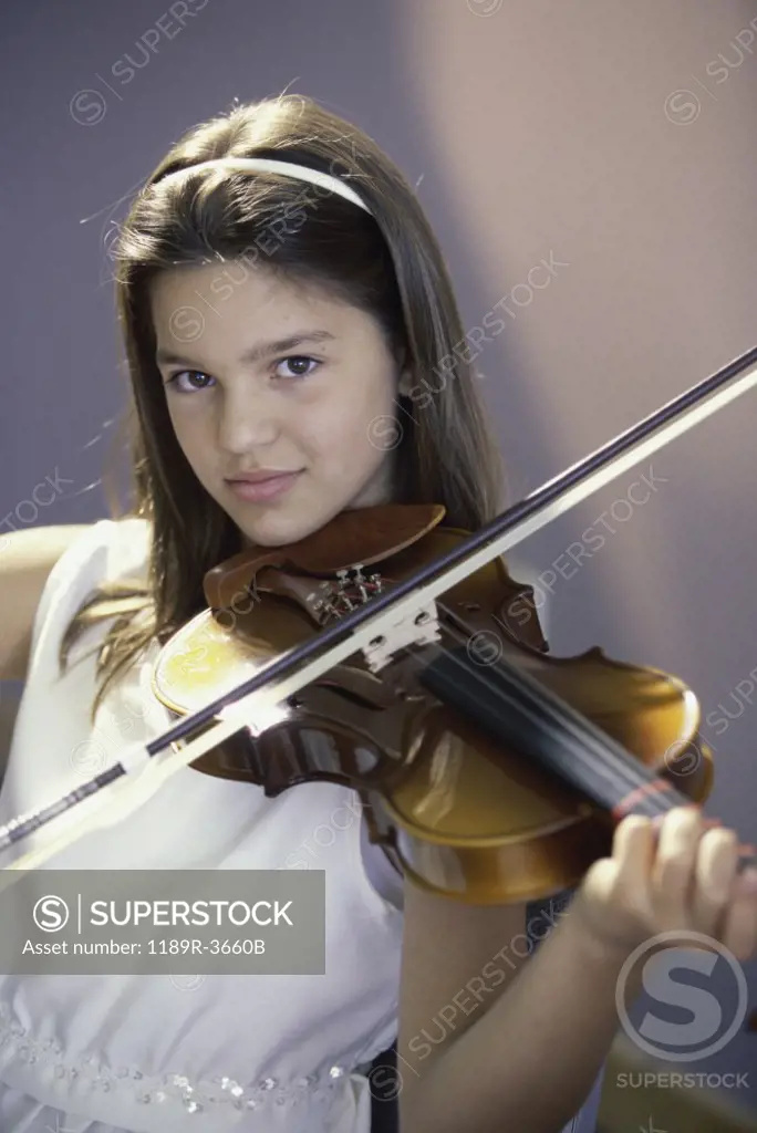 Portrait of a girl playing a violin