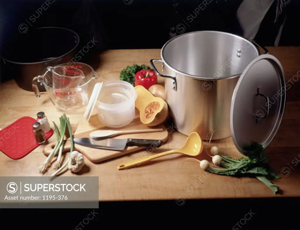 High angle view of vegetables and kitchen utensils on a kitchen counter