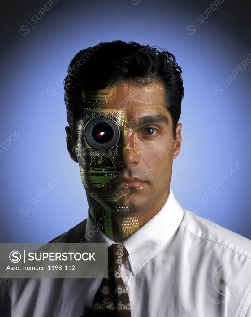Businessman's face superimposed with a circuit board