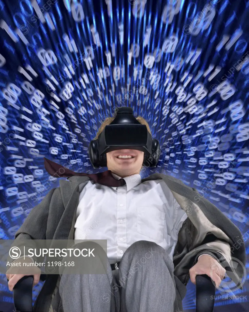 Mid adult man wearing virtual reality goggles
