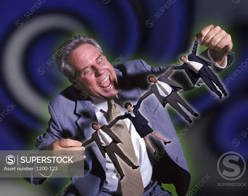 Businessman holding a cutout of business executives