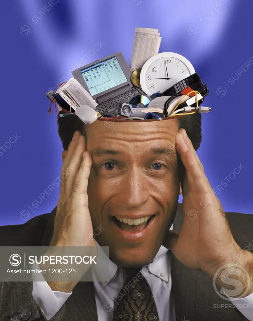 Businessman with gadgets in his head