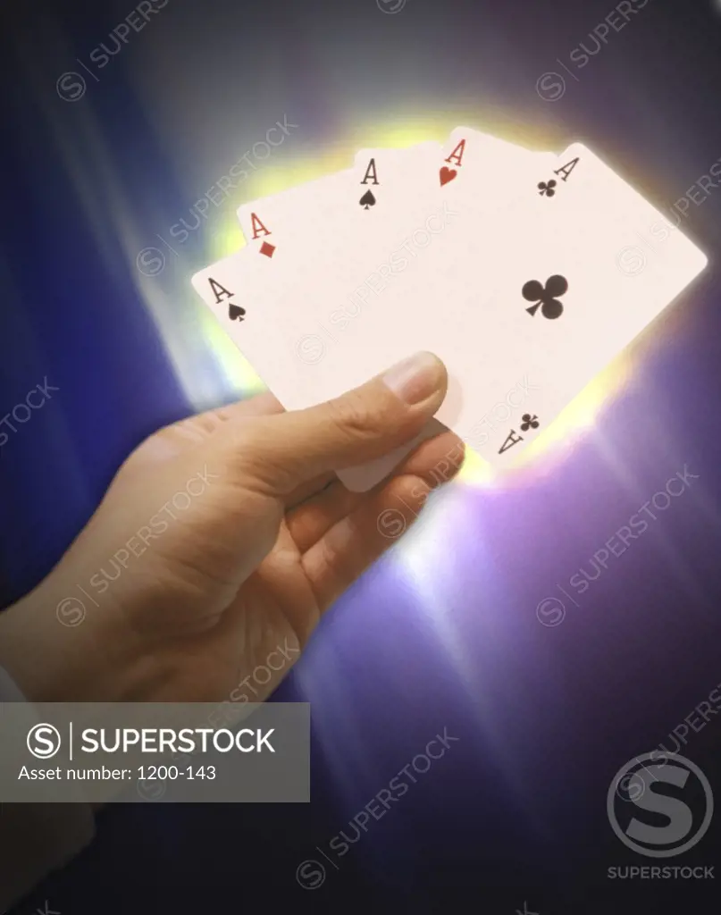 Person holding five aces
