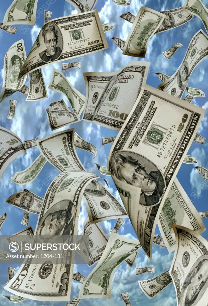 Us dollar bills floating in air