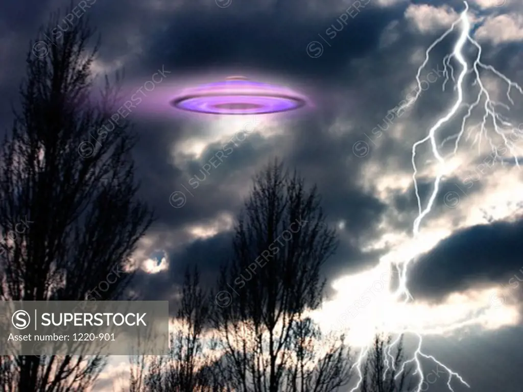 Low angle view of a flying saucer and lightning in the sky