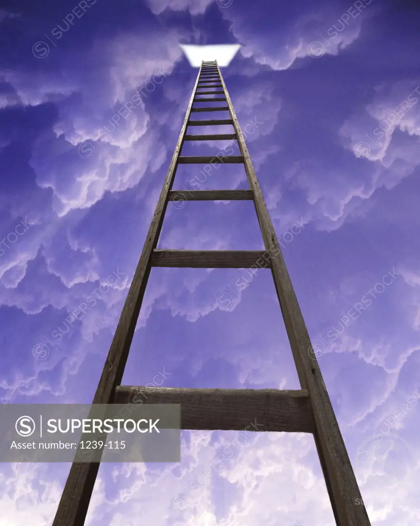 Low angle view of a ladder reaching into the clouds