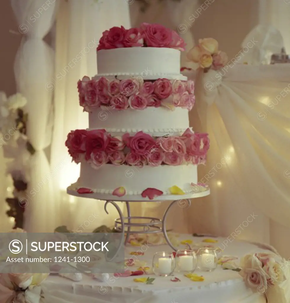 Decorated tiered wedding cake on a table