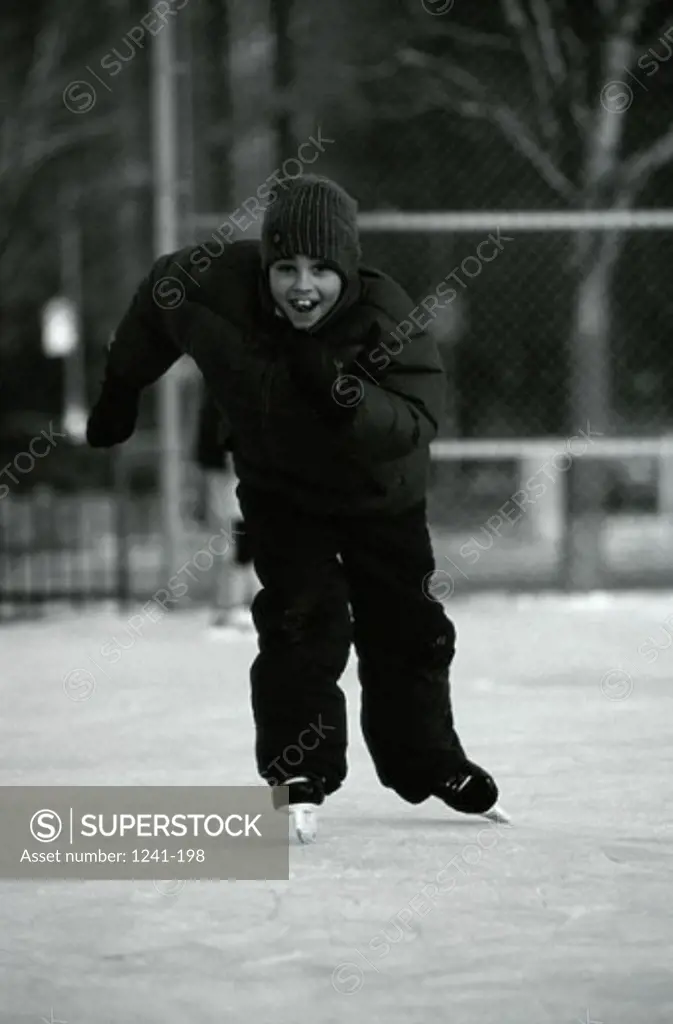 Portrait of a child ice skating