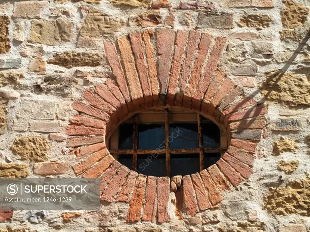Italy, Tuscany, Province of Siena:  Montisi, decorative window frame