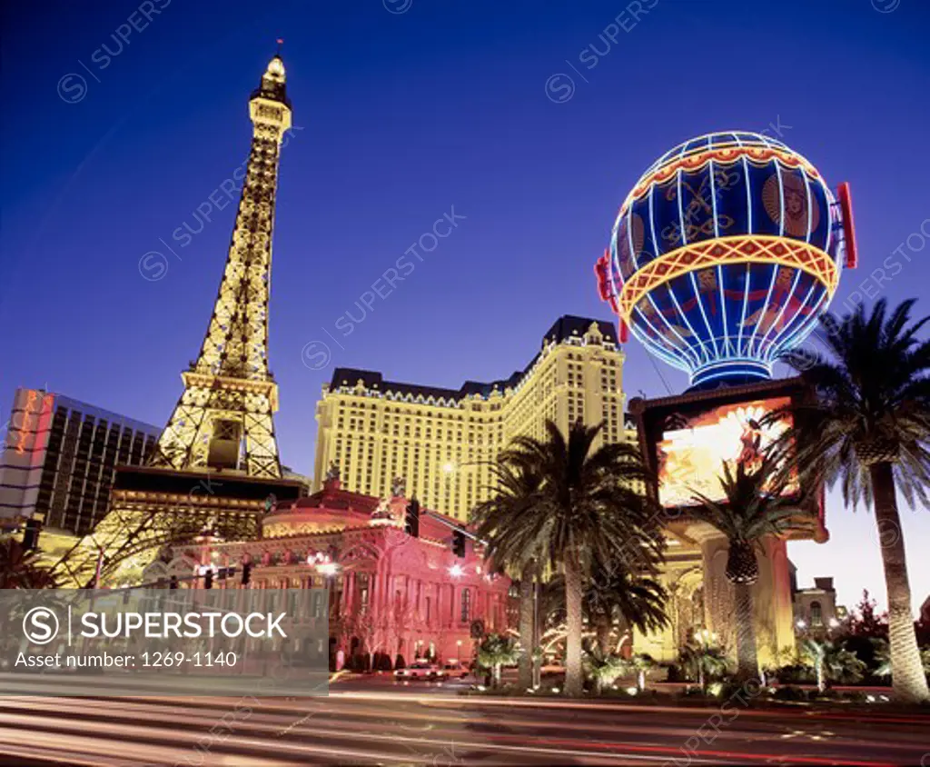 Low angle view of a replica of the Eiffel Tower lit up at night, Paris Las Vegas Hotel and Casino, Las Vegas, Nevada, USA