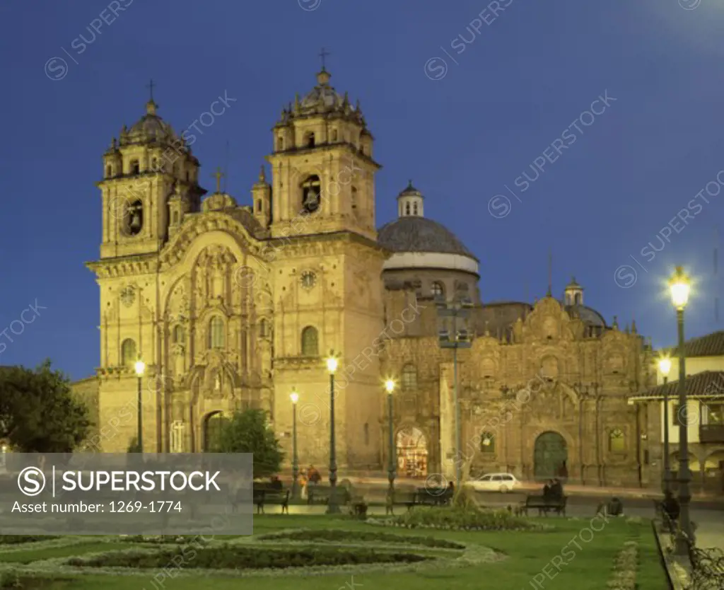 Facade of a church lit up at night, La Compania, Plaza de Armas, Cuzco, Peru