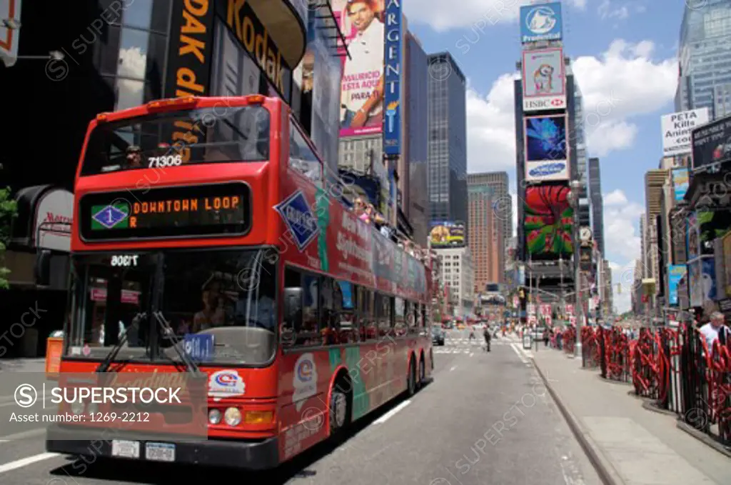 Double-decker bus on a road, Times Square, Manhattan, New York City, New York, USA