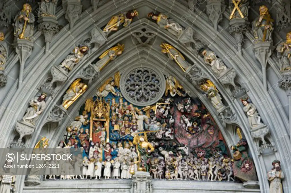 Low angle view of statues in a cathedral depicting the Last Judgment, Bern Cathedral, Berne, Switzerland