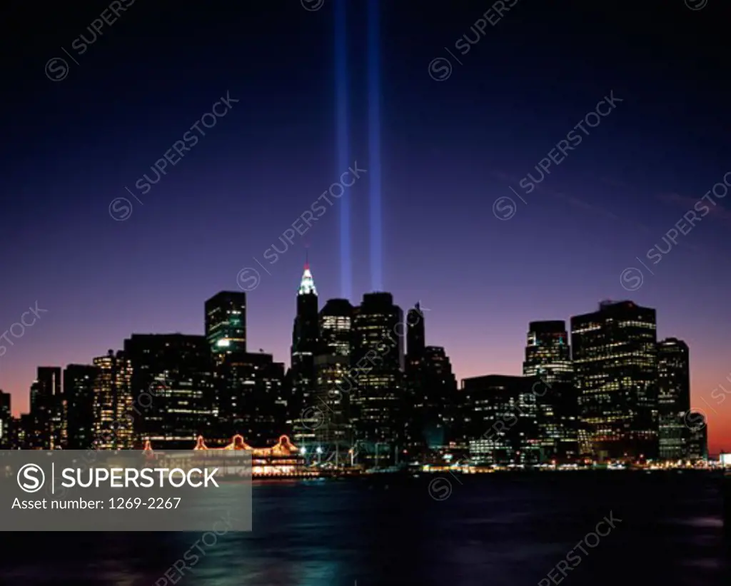 Buildings lit up at night, September 11th Memorial, New York City, New York, USA