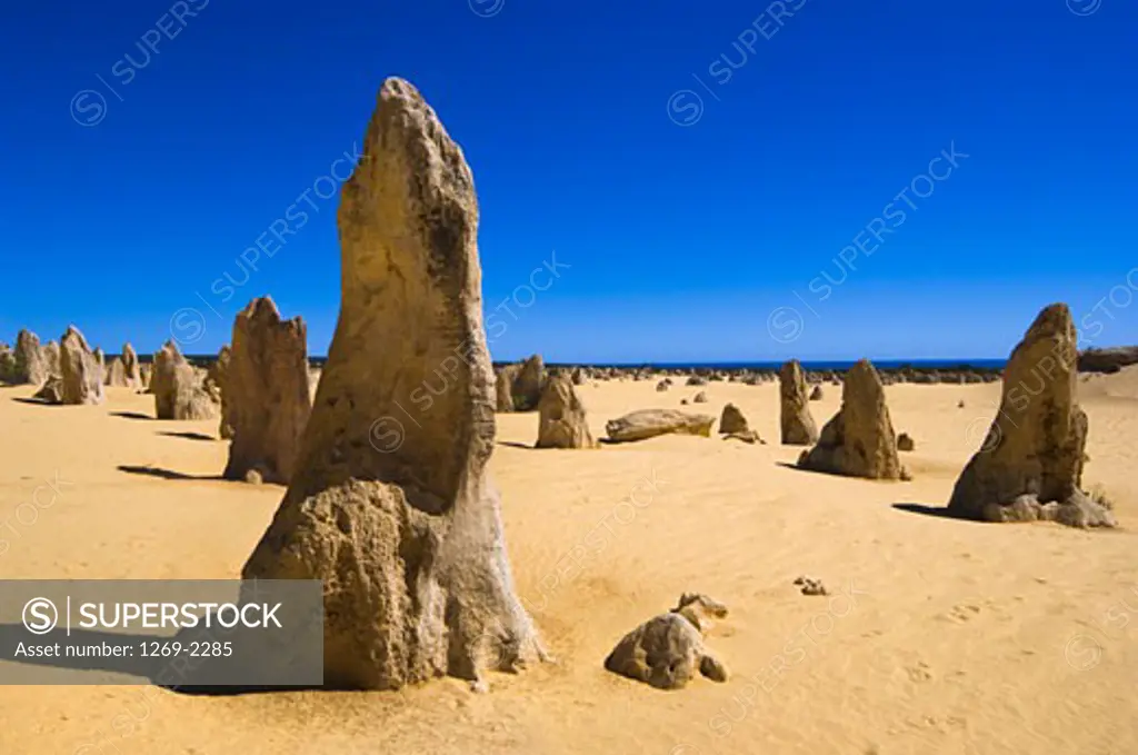 Rock formations in a desert, The Pinnacles Desert, Nambung National Park, Australia