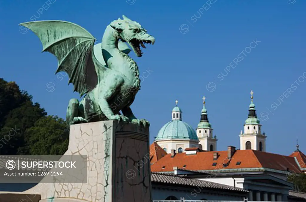 Dragon statue on a pedestal, Dragon Bridge, Ljubljana, Slovenia
