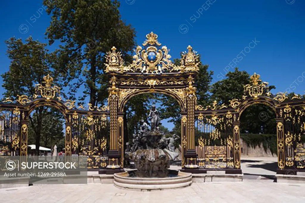 Fountain in front of gilded gates, The Neptune Gate, Fountain of Amphitrite, Place Stanislas, Nancy, Meurthe-et-Moselle, France
