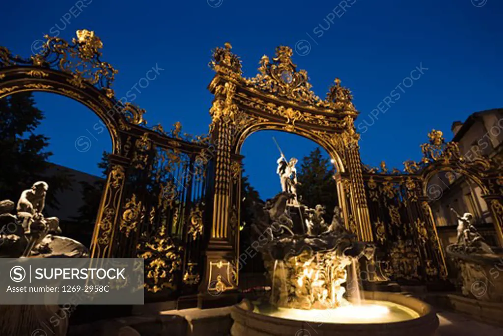 Fountains in front of gilded gates, The Neptune Gate, Fountain of Amphitrite, Place Stanislas, Nancy, Meurthe-et-Moselle, France