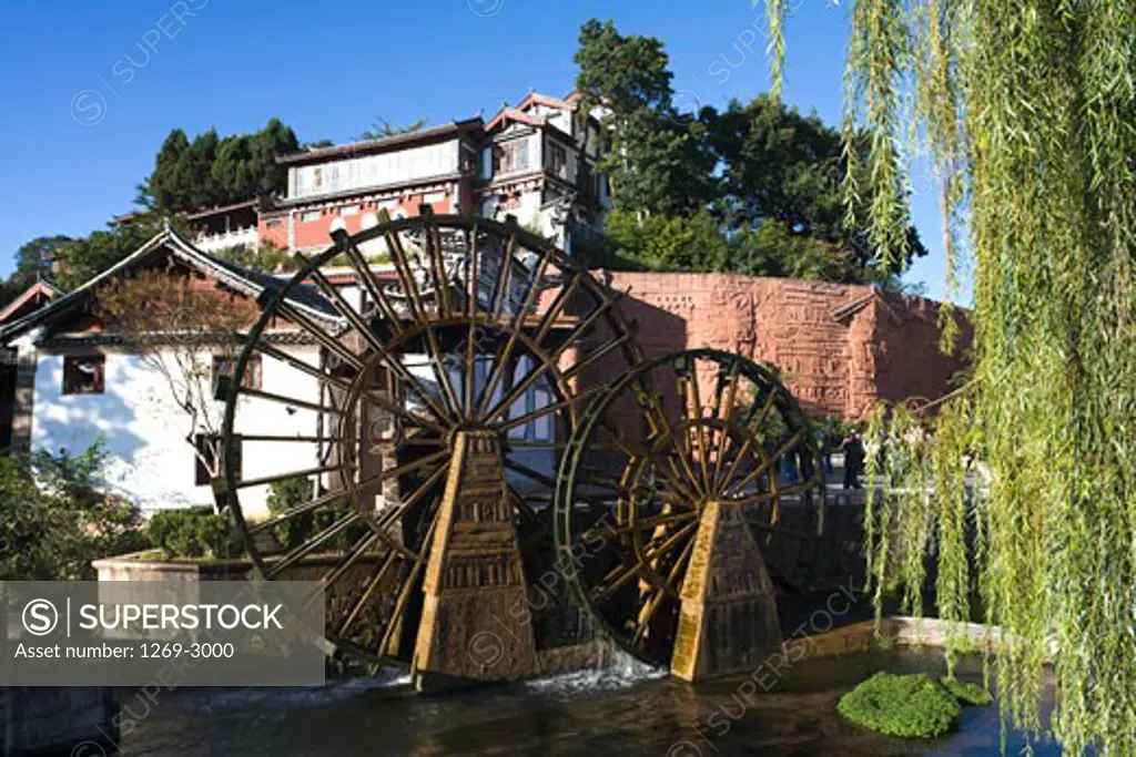Watermill in a town, Lijiang, Yunnan Province, China