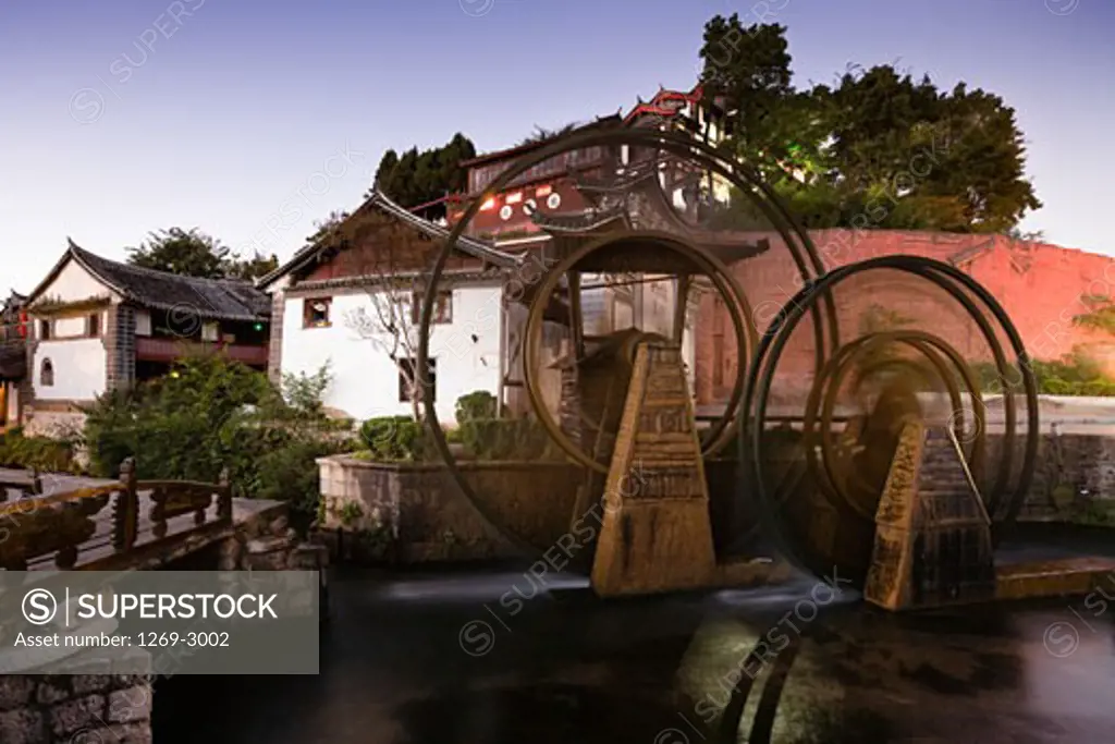 Watermill in a town, Lijiang, Yunnan Province, China