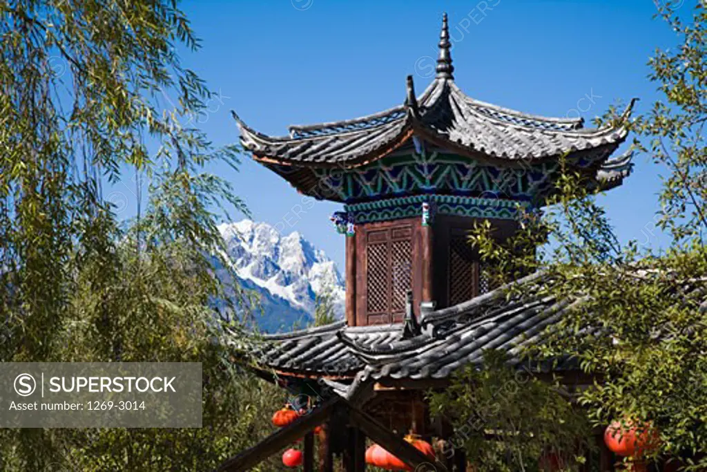 Buildings in a town, Jade Dragon Snow Mountain, Shigu Town, Lijiang, Yunnan Province, China
