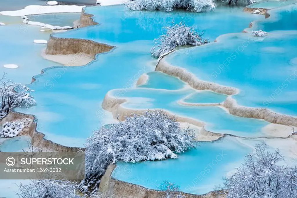 Frost covered trees at the lakeside, Wucai Pond, Huanglong, Sichuan Province, China