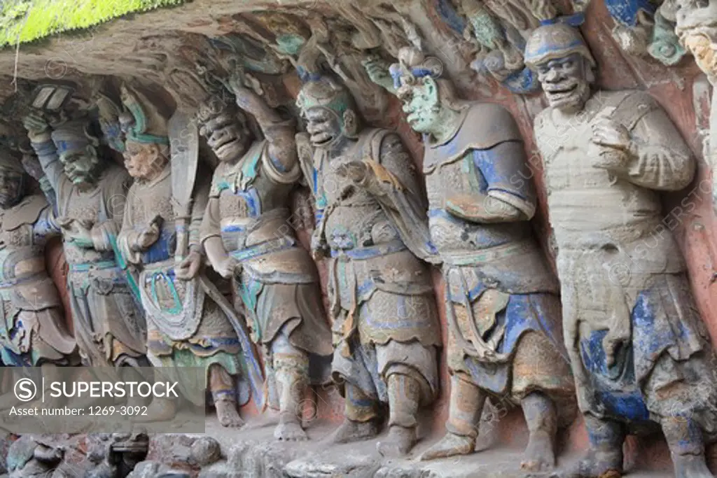 Statues in a temple, Niche of Guardians of Buddhist Law, Dazu, Chongqing, China