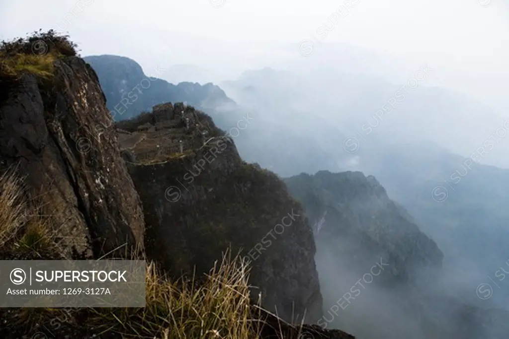 Mountain range covered with fog, Mount Emei, Sichuan Province, China