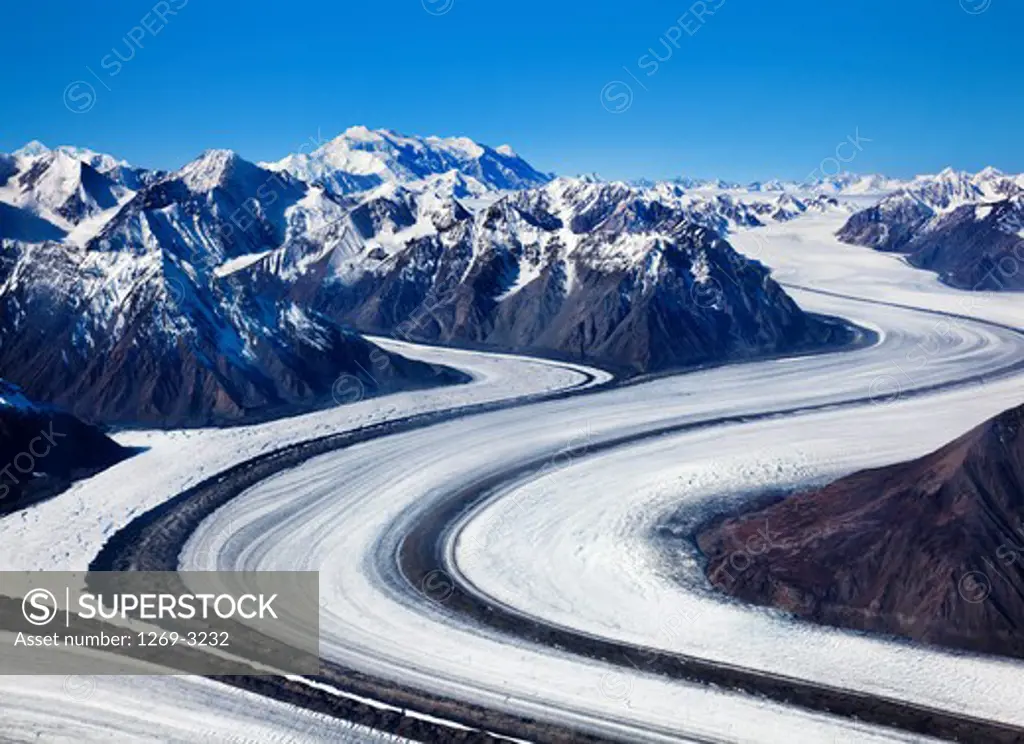 Snow covered road passing through mountains, Kaskawulsh Glacier, Kluane National Park, Yukon, Canada