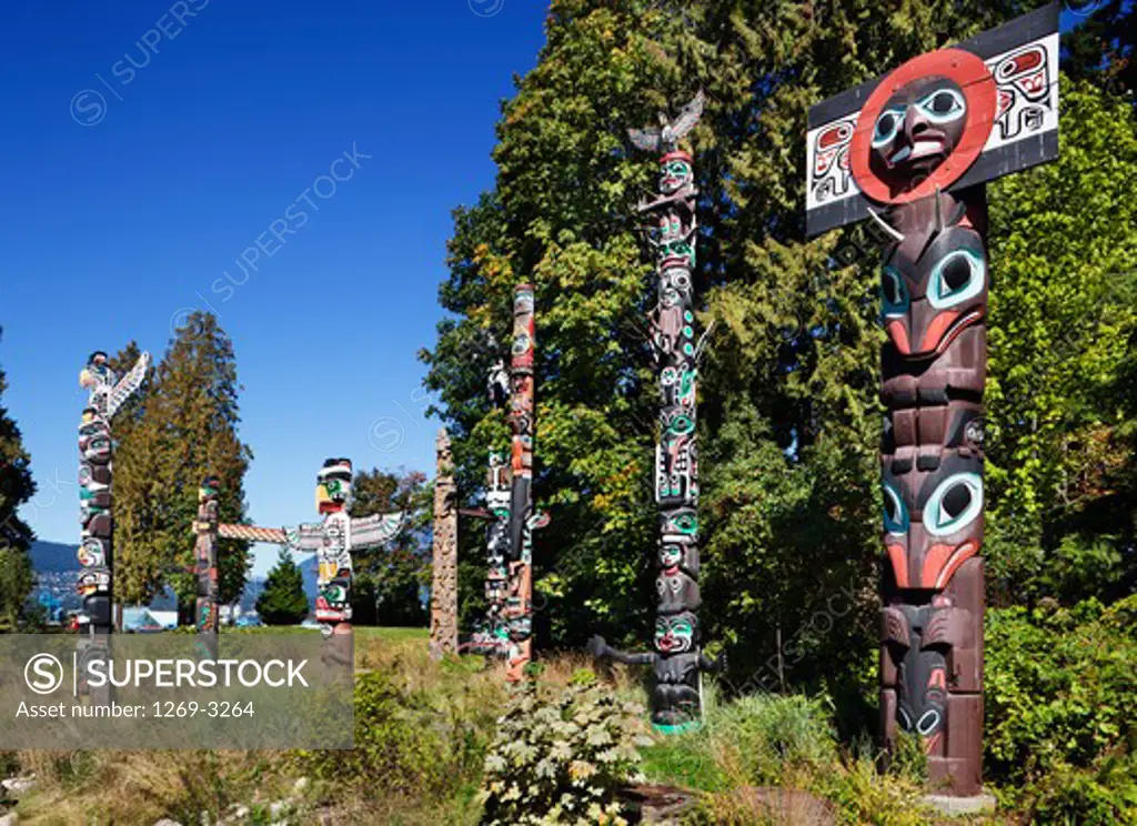 Totem poles in a field, Stanley Park, British Columbia, Canada