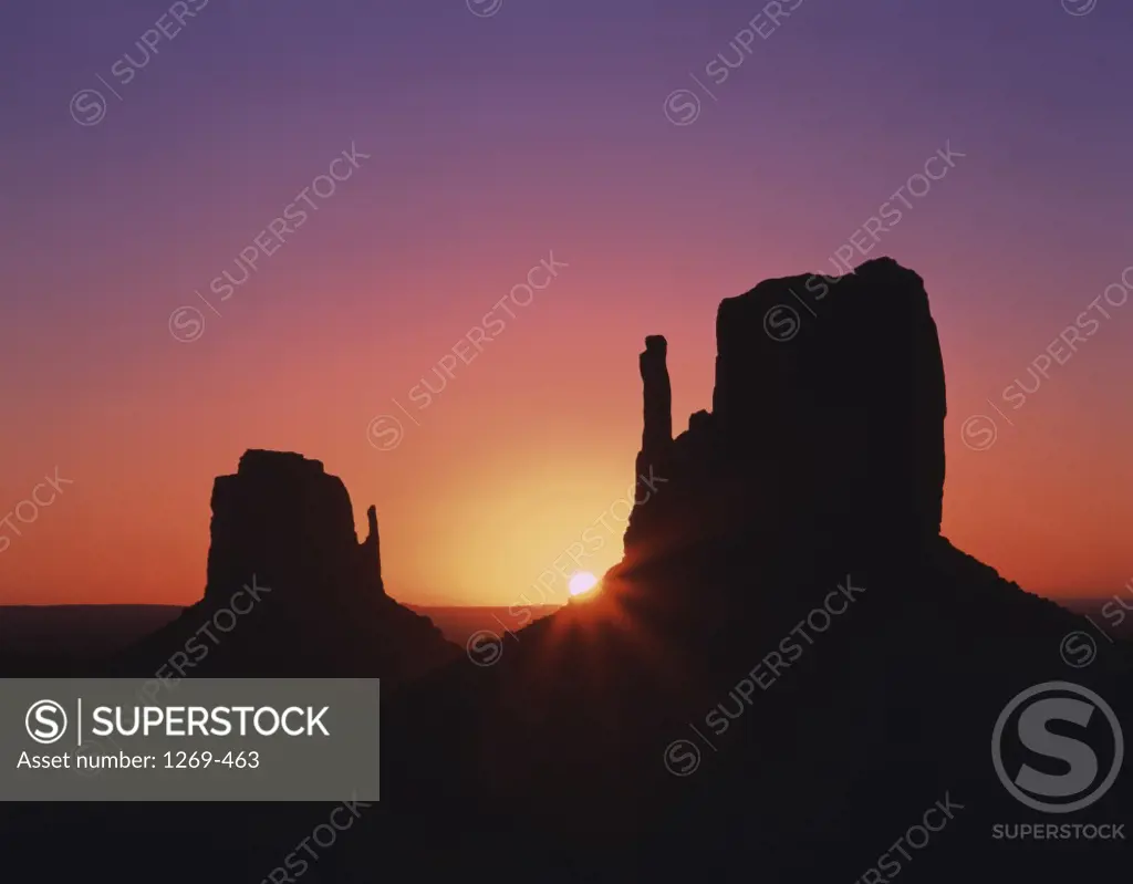 Silhouette of rock formations, Mittens Buttes, Monument Valley, Arizona, USA