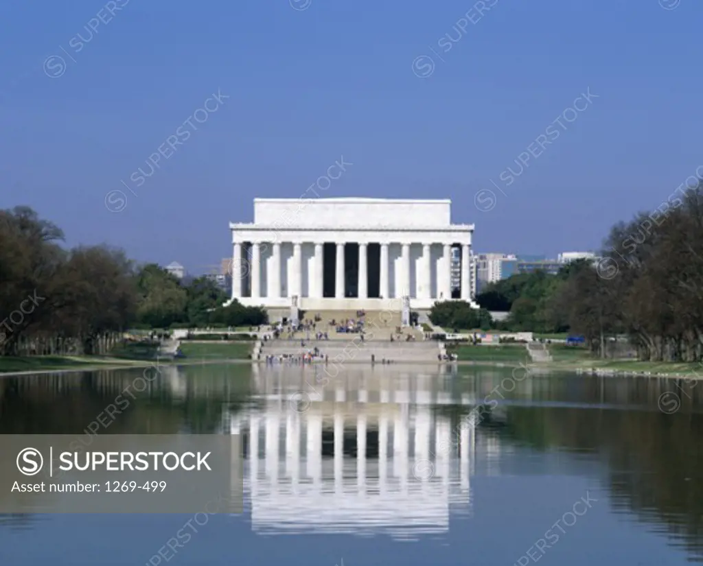 Reflection of a monument in water, Lincoln Memorial, Washington DC, USA