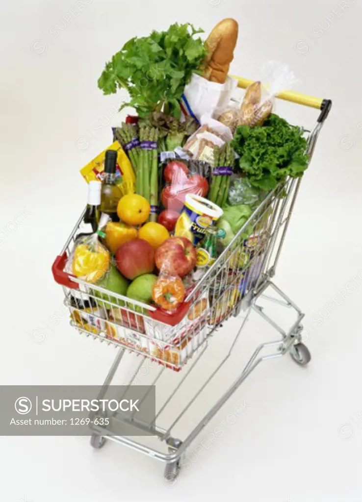 High angle view of a shopping cart with groceries