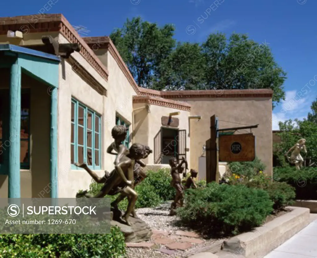 Statues in front of a building, Canyon Road, Santa Fe, New Mexico, USA