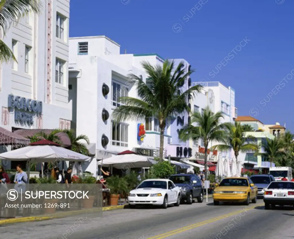 Cars parked on a road in front of buildings, Ocean Drive, Miami Beach, Florida, USA