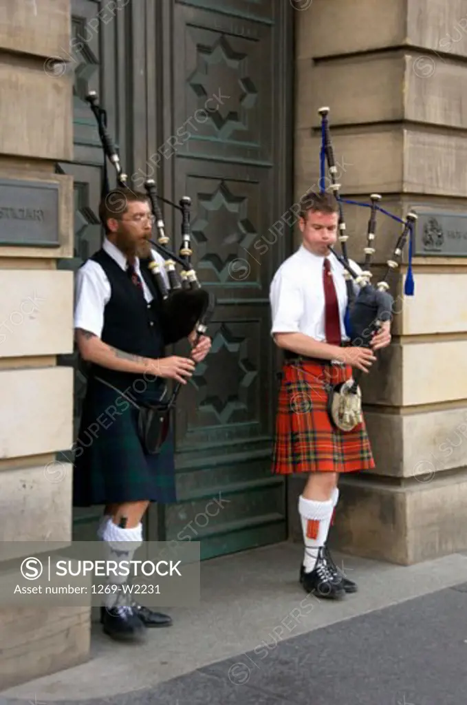 Two bagpipers playing bagpipes, Edinburgh, Scotland